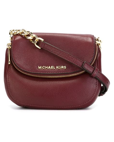 michael kors fold over purse.